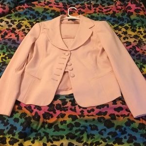 A Two Piece Skirt Suit